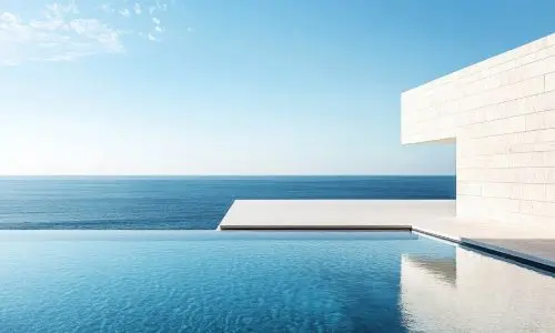 Moderner Infinity Pool auf Mallorca mit Meerblick – Poolbau von Homefix